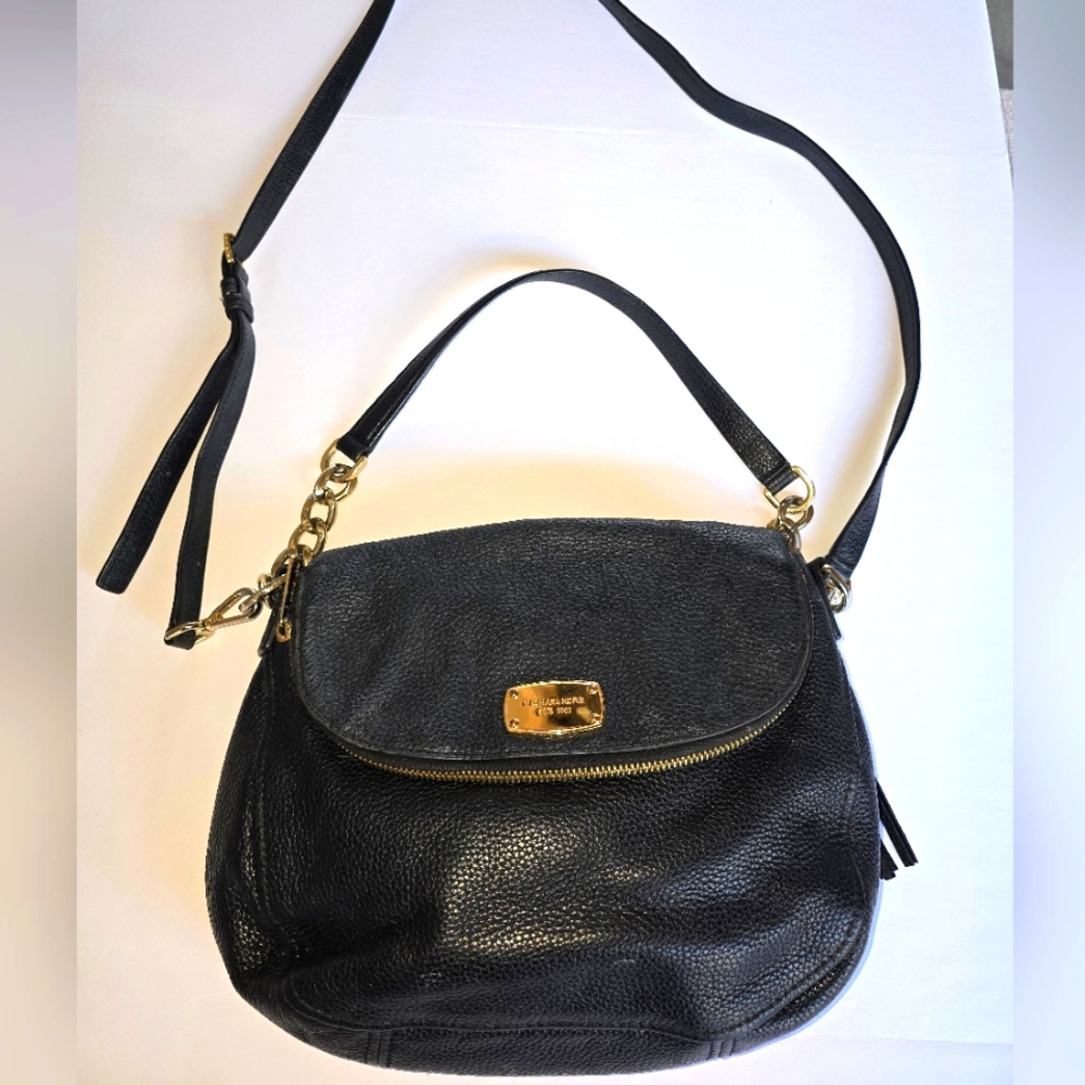 Chic Black Leather Shoulder Bag with Gold Accents.  Crossbody.